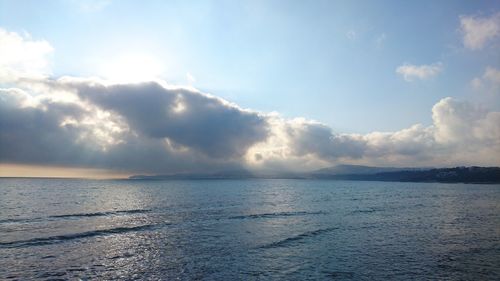 Scenic view of sea against cloudy sky