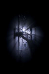 Silhouette of building at night