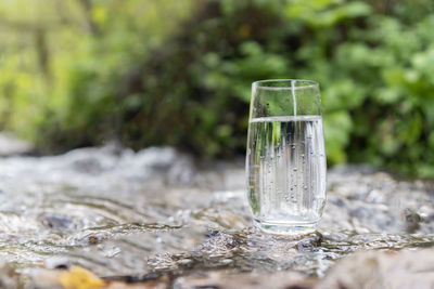 Close-up of water in glass on table