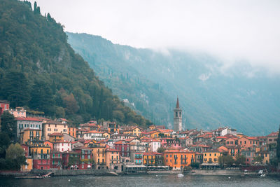 The little town of varenna sitting on the edge of lake como, italy.
