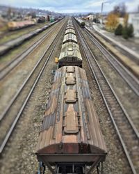 Train on railway station against sky