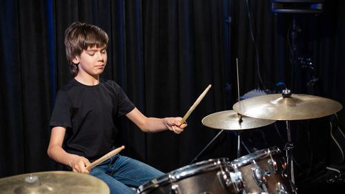 Young man playing piano