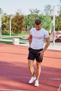 Male runner getting ready