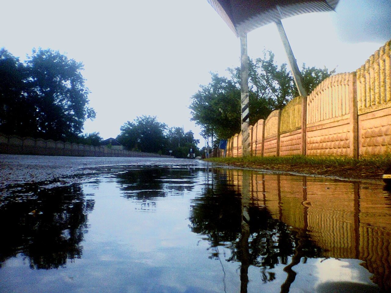 reflection, water, tree, architecture, built structure, nature, outdoors, no people, waterfront, sky, lake, building exterior, day, puddle, beauty in nature