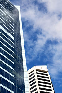 Low angle view of modern buildings against sky