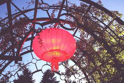 Low angle view of lantern against clear sky