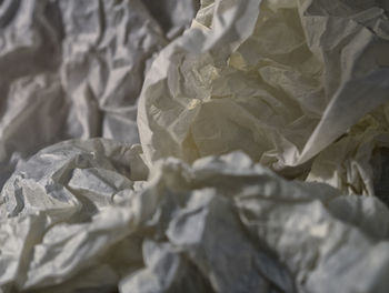 Close-up of garbage on bed