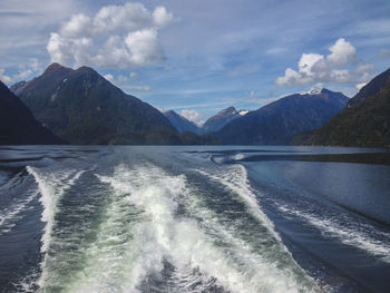 Scenic view of sea against mountains