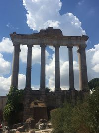 Low angle view of old ruins against sky