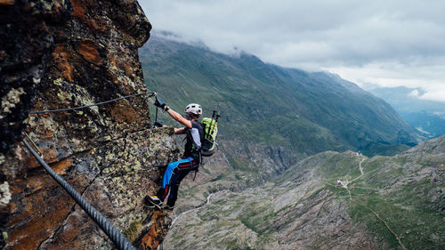 Hiker hiking on mountain