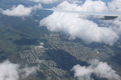 Airplane flying over landscape