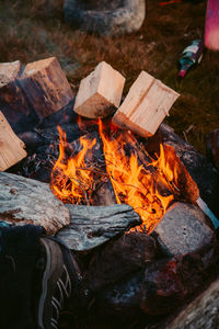 High angle view of bonfire on wood