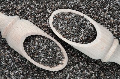 Directly above shot of chia seeds in serving scoops