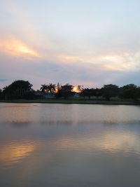 Scenic view of lake against sky during sunset