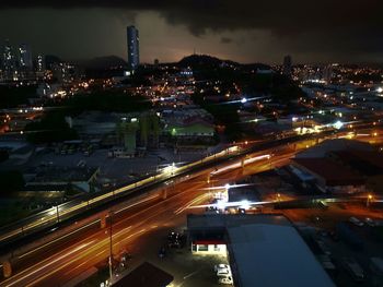 High angle view of illuminated city buildings at night