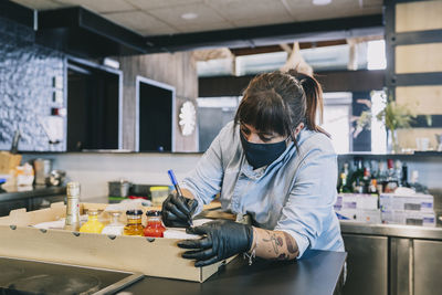 Woman working on table