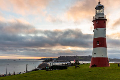 Plymouth lighthouse in hoe at sunset.