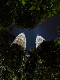 Low angle view of trees against sky
