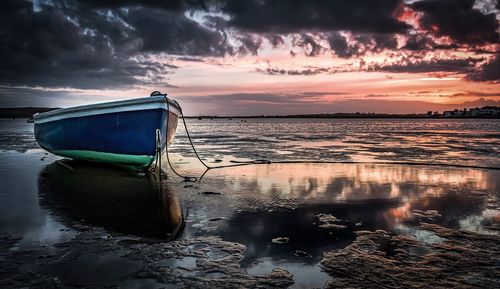 Scenic view of sea against dramatic sky