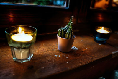 Close-up of tea light candles on table