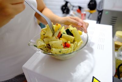 Close-up of woman eating food