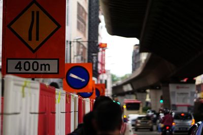 Road sign on street in city