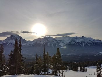 Scenic view of mountains against sky during winter