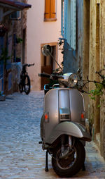 Vintage car parked on street outside house