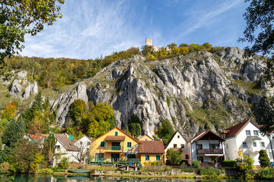 High rocks in the village essing in bavaria, germany at the altmuehl river on a sunny day in autumn