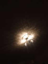 Low angle view of illuminated lamp post