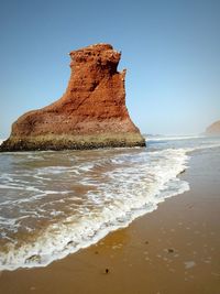 Scenic view of sea against clear sky