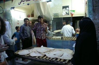 Group of people at restaurant in city