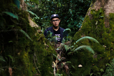 Portrait of man in forest