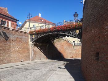 Bridge over river against sky