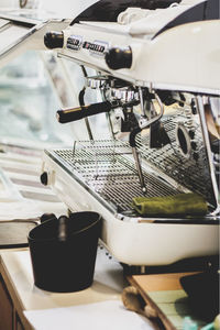 Close-up of espresso maker at cafe