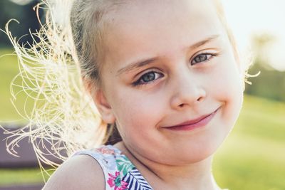 Close-up portrait of smiling girl