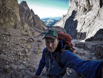 Portrait of woman standing on mountain