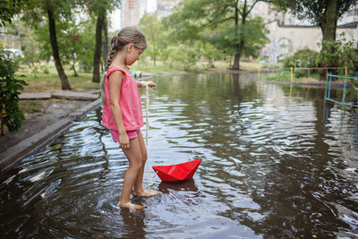 Full length of woman in lake