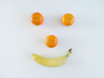 Close-up of orange against white background