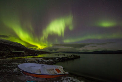 Scenic view of sea against sky at night