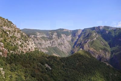 Scenic view of mountains against clear sky