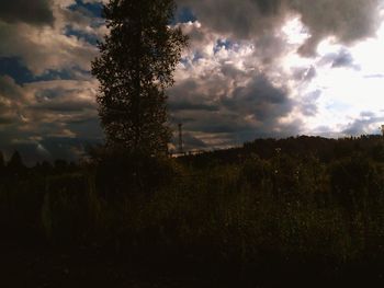 Scenic view of landscape against cloudy sky