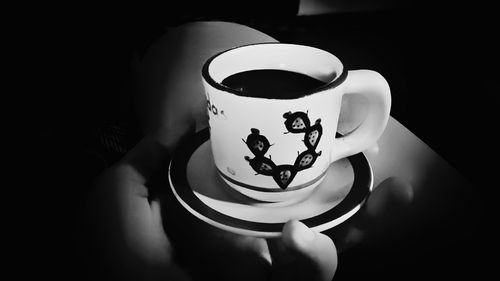 Close-up of coffee cup on table