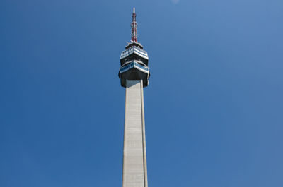 Low angle view of building against blue sky