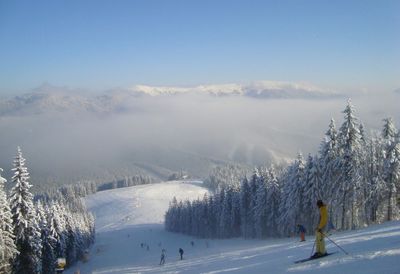Scenic view of snowcapped mountain against sky