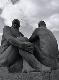 Low angle view of statue against sky