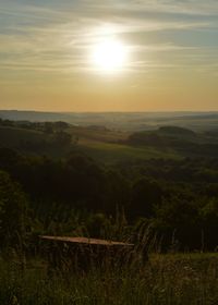 Scenic view of landscape at sunset