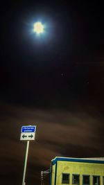 Low angle view of neon sign at night