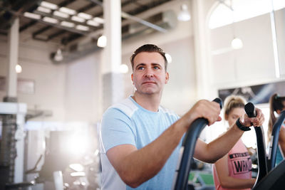 Man exercising at gym