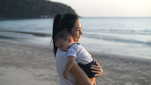 Mother and daughter on beach